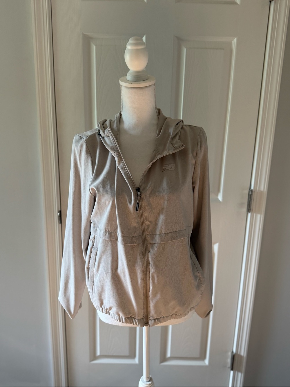 New Balance Women's Hooded Lightweight Jacket in Beige